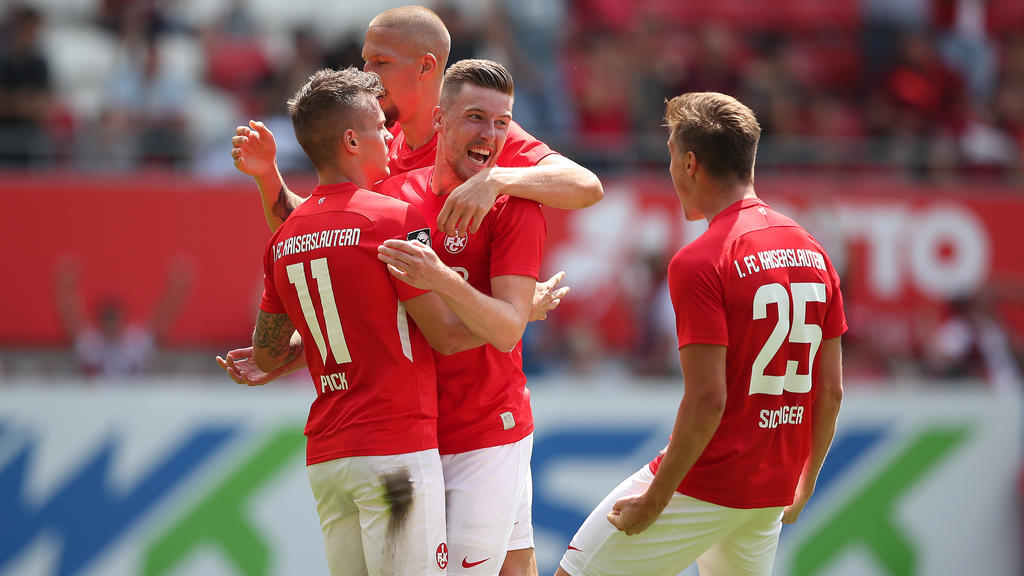 KAISERSLAUTERN, GERMANY - JULY 20: Florian Pick of 1.FC Kaiserslautern celebrates after scoring his team`s first goal with team mates Christian Kuehlwetter of 1.FC Kaiserslautern and Carlo Sickinger of 1.FC Kaiserslautern during the 3. Liga match between 1. FC Kaiserslautern and SpVgg Unterhaching at Fritz-Walter-Stadion on July 20, 2019 in Kaiserslautern, Germany. (Photo by Christian Kaspar-Bartke/Getty Images for DFB)