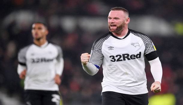 DERBY, ENGLAND - JANUARY 02: Wayne Rooney of Derby County celebrates his sides first goal during the Sky Bet Championship match between Derby County and Barnsley at Pride Park Stadium on January 02, 2020 in Derby, England. (Photo by Laurence Griffiths/Getty Images)